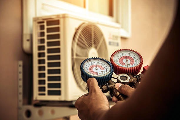 Professional Hvac technician working in Titus, AL